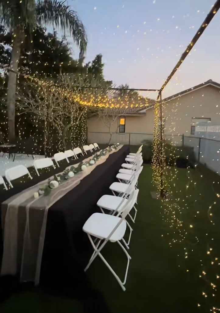 Backyard party with string lights